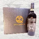 Fles met verpakking.webp