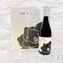 Fles met verpakking.webp