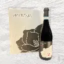 Fles met verpakking.webp